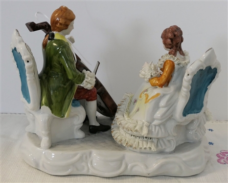 Porcelain Musician Figure with Porcelain Lace Skirt, Cuffs, and Collar  - Measures 8 3/4 tall 10 Long by 6 Across 