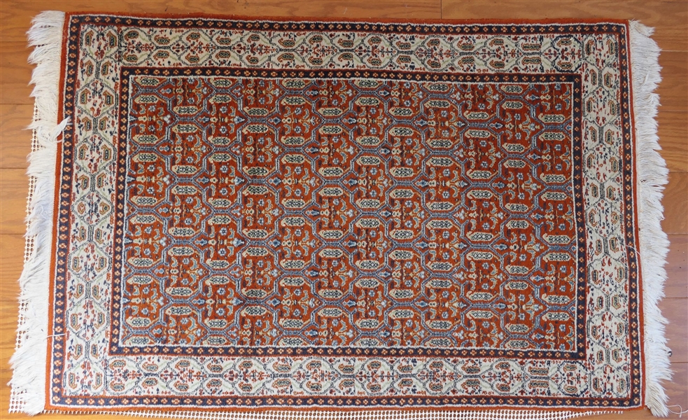 Finely Woven Oriental Rug -Rusty Red with Cream, Navy, and Green Details -  Measuring 45" by 31" - 