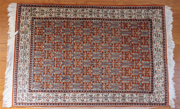 Finely Woven Oriental Rug -Rusty Red with Cream, Navy, and Green Details -  Measuring 45" by 31" - 