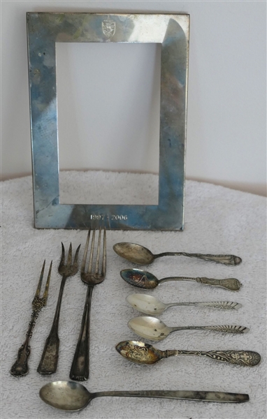 9 Sterling Silver Souvenir Spoons, Pickle Forks, and Other Utensils and Engraved and Dated Tiffany and Co. Sterling Silver Photo Frame - Frame Measures 7 1/4" by 5 1/4" 