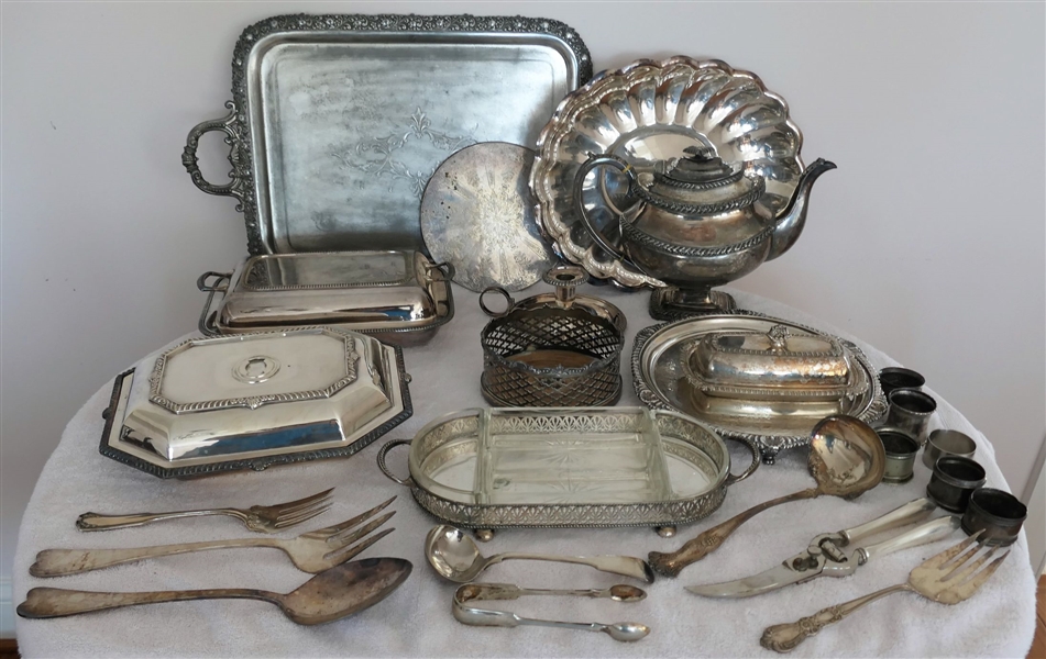 Large Lot of Silverplate Items including Trays, Tea Pot, Oval Reed and Barton Bowl, Covered Dishes, Butter Dish, Napkin Rings, Serving Utensils, Candle Holder, and Wine Coaster