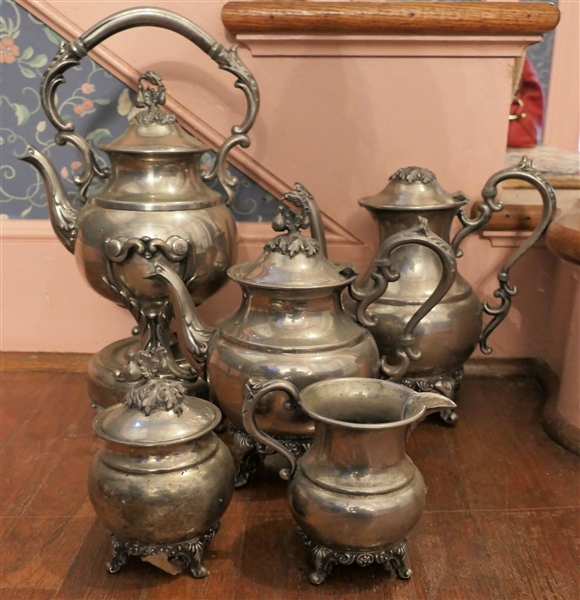 Hallmarked Silver on Copper - 5 Piece Silverplate Tea Service including Tea Pot with Warmer, Coffee Pot, Tea Pot, Creamer, and Sugar- 1 Lid is Missing Top Knob 