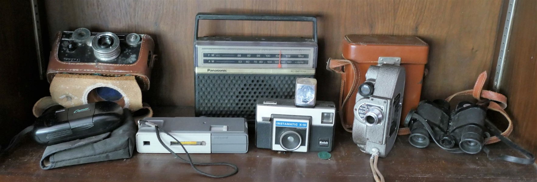 Collection of Camera Equipment, Radio, and Binoculars - Panasonic Radio, Kodak Instamatic X15 Camera, Revere Eight Camera, Argus, and Others