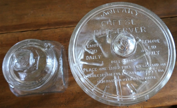 Sanitary Cheese Preserver Glass Lidded Jar and Glass Lidded Jar - Turning Purple with Age - Cheese Jar Measures 5 1/2 tall 7 1/2 Across