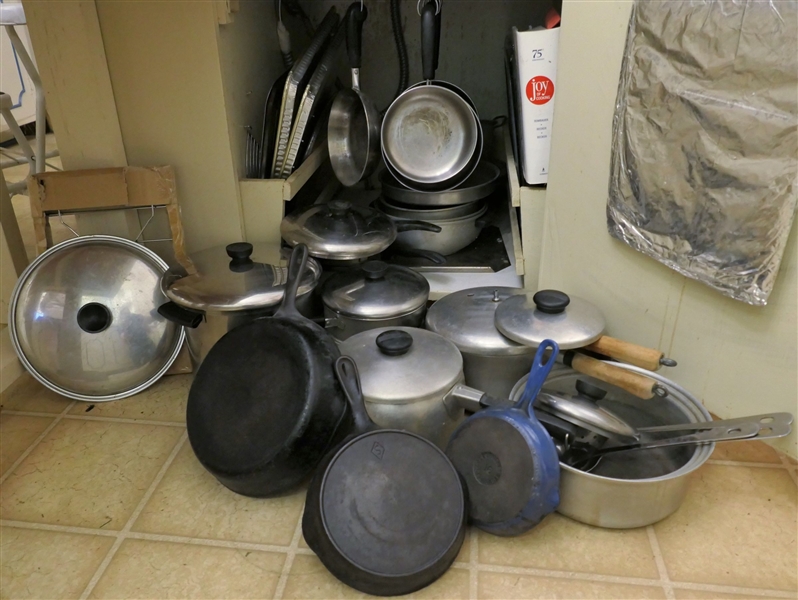 Cabinet Lot of Cookware including Cast Iron, Revere Ware, Le Creuset, and Others - Also included Some Utensils and Cook Book 