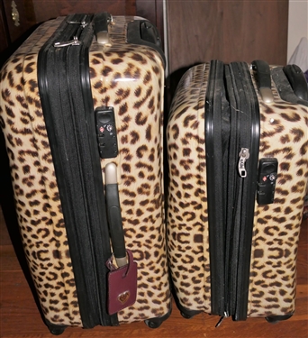 2 Leopard Print Rolling Hard Side Suitcases by Heys 