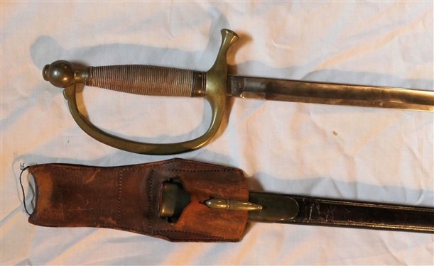Civil War Ames Mfg. Co. - US GWC 1864 Sword - Marked Ames Mfg. Co. Chicopee Mass - In Fine Brass and Leather Scabbard - Scabbard Has Leather Belt Strap Added Later Marked Rock Island Arsenal 19030