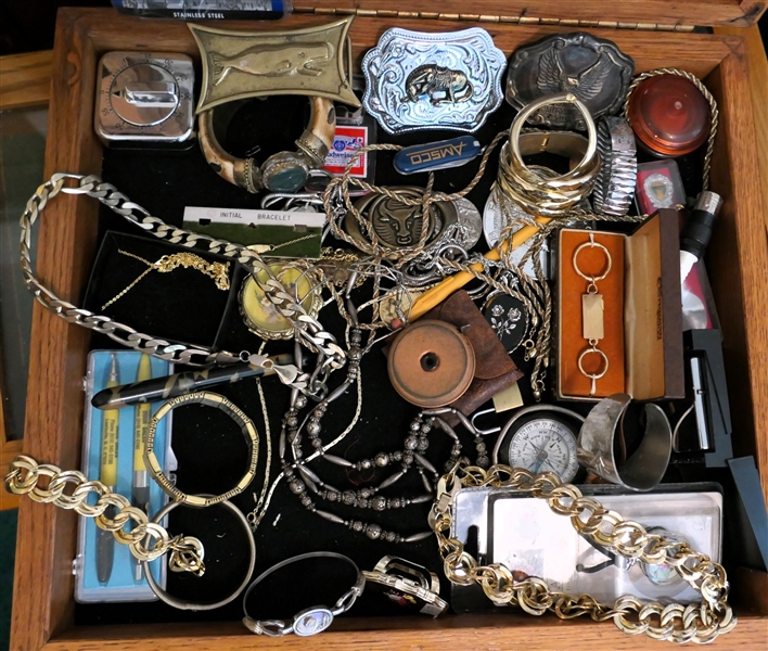 Oak Display Case Full of Trinkets, Costume Jewelry, Zippo Lighter, Belt Buckles, Cuff Bracelet, Pocket Knives, Compass, Silver Necklace, Fountain Pen, Etc. - Case Measures 3" Tall 17" by 15" 
