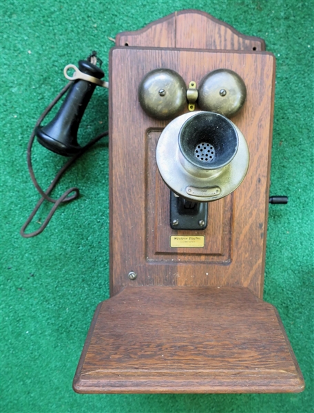 Western Electric Company - Oak Wall Phone - With Works -Measures 22" Long 9" 5 1/2"