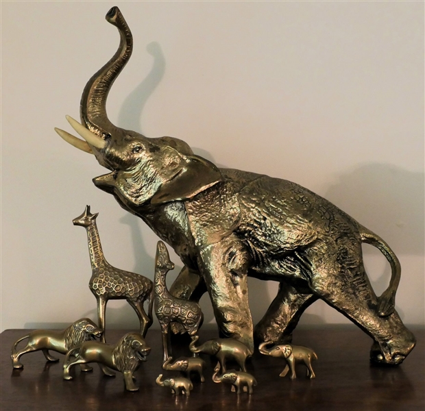 Large Gold Tone Zinc Elephant Figure, 2 Brass Giraffes, 2 Brass Lions, and 5 Brass Elephants - Zinc Elephant Measures 15" Tall 17" Trunk to Tail 