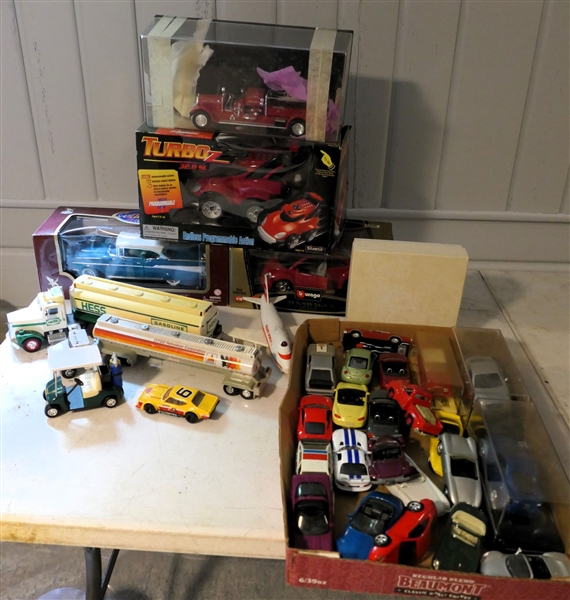 Lot of Metal, Die Cast, Toy Cars including Hess Trucks, Turbo Programable Truck, 1957 Bel Air, Volkswagen, Winross Truck, Transworld Plane, Citgo Tanker Truck, and Others