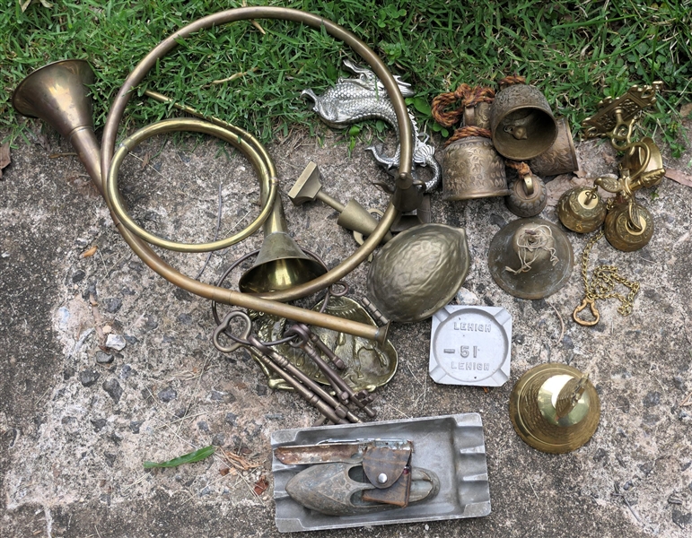 Lot of Brass Items including Brass Nut Nutcracker, Horn, Bells, Pineapple Bell, and Ashtrays