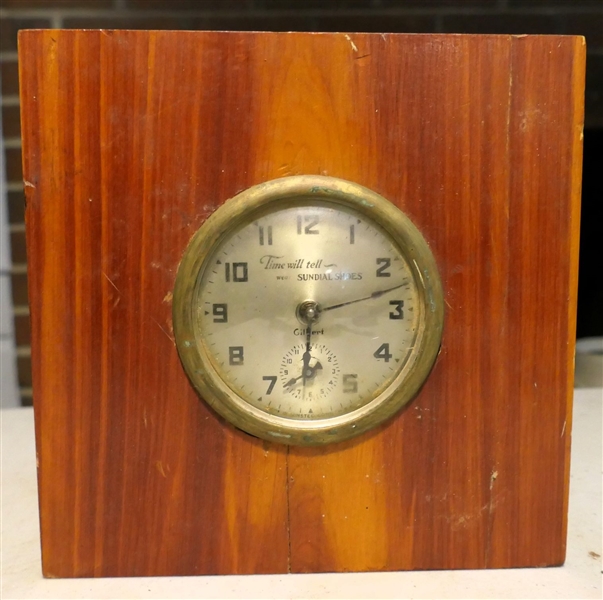 "Time Will Tell, Wear Sundial Shoes" Advertising Gilbert Alarm Clock - Cedar Case - Measures 7 1/2" tall 7 1/2" by 1 1/2" - Clock Runs