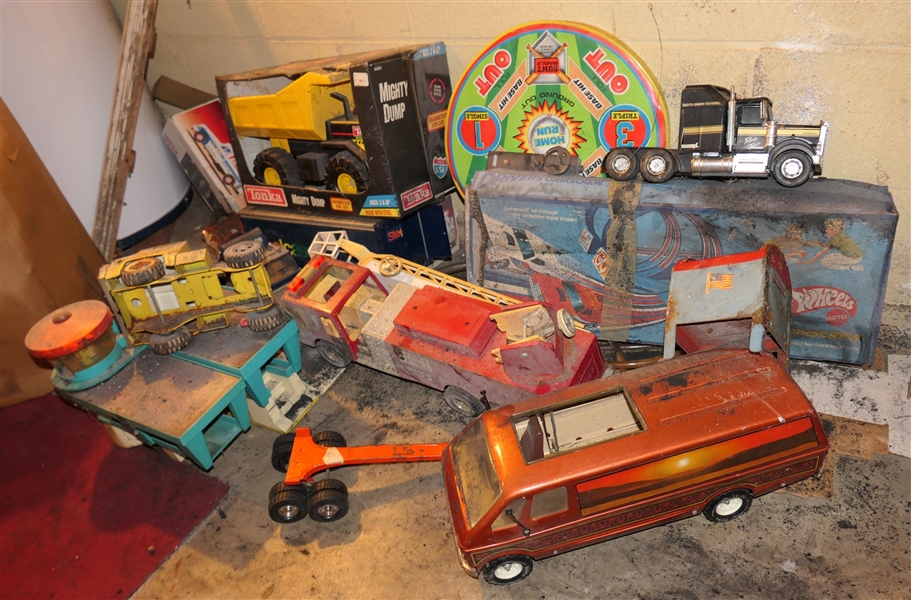 Lot of Toys including Tonka Van, Tonka Dump Truck in Original Box, Fire Truck, Hot Wheels Cars, and Others - All in Good Condition Just Need Cleaning