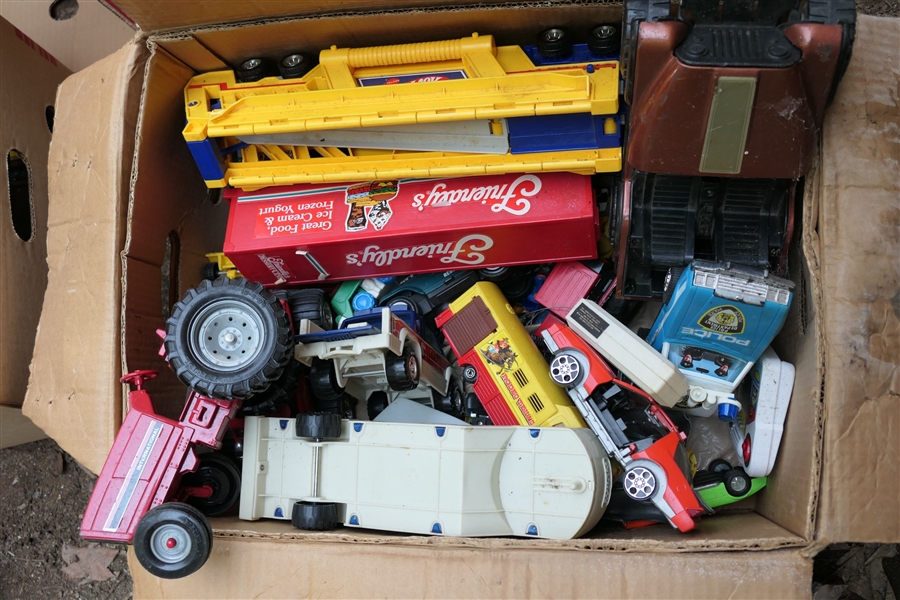 Box of Trucks, Tractors, Toy Guns, Cards - Tyco Lamborghini Challenge Racing Game, Matchbox City Garage, and Tyco Supervettes 