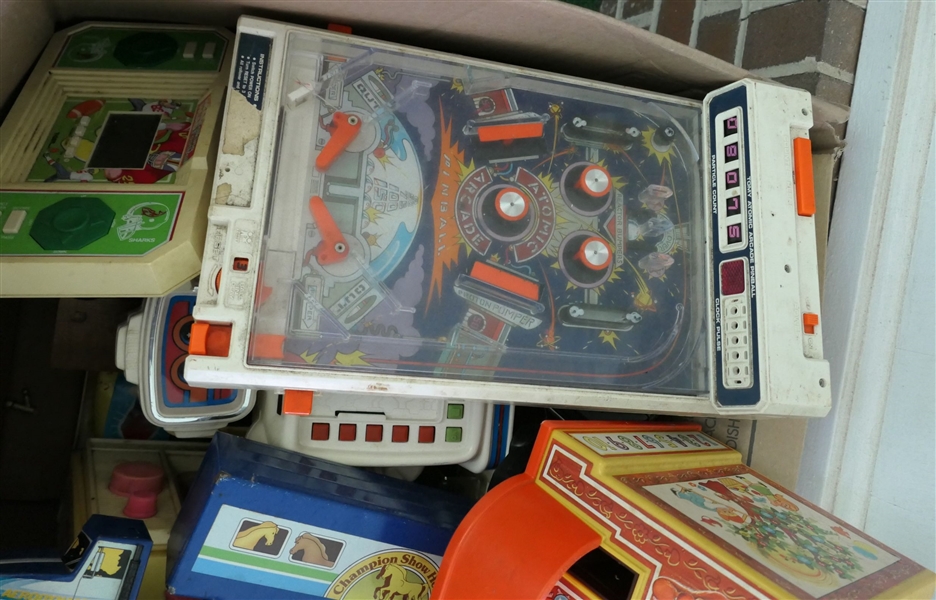 Box Lot of Toys including Atomic Arcade, Fisher Price Cash Register, Robot, Polaroid Camera, Horse Trailer, Etc. 