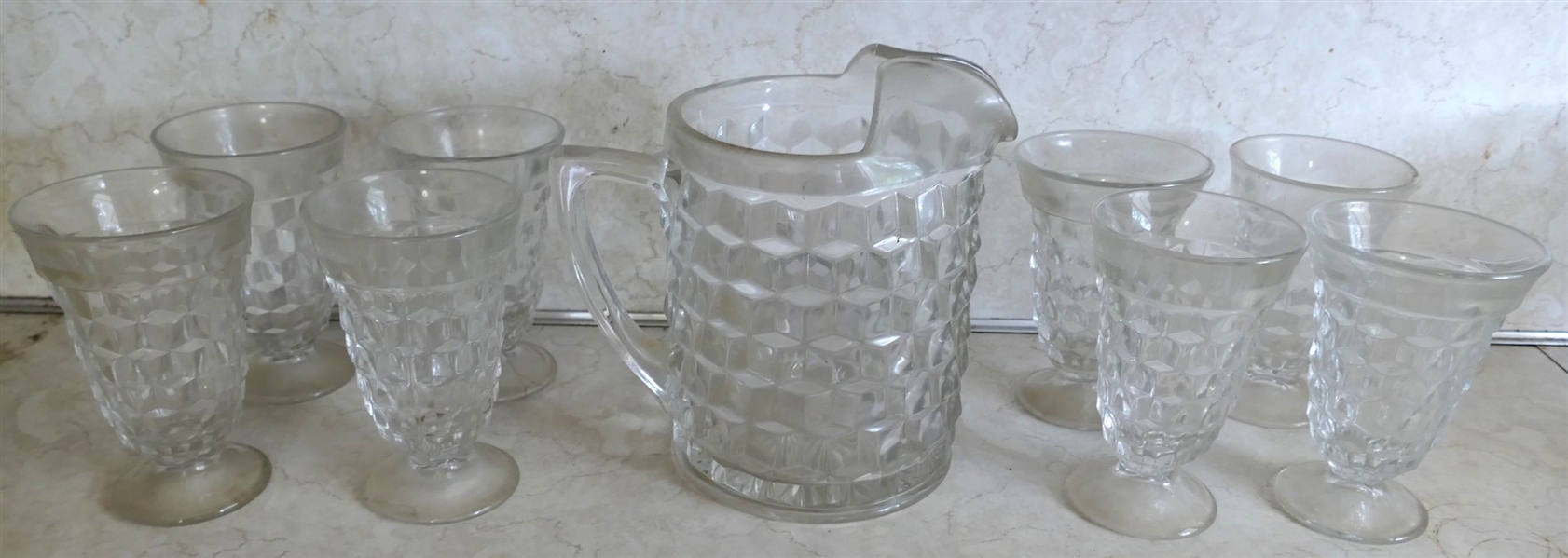 American Fostoria Pitcher and 8 Footed Glasses - Pitcher Measures 8 1/2" tall - Glasses 5 3/4"