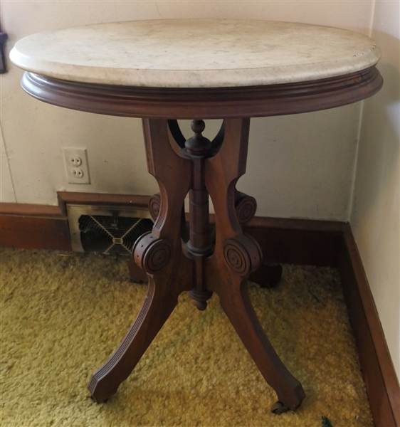 Oval Walnut Victorian Marble Top Table - Measures 29" tall 26" by 20" 