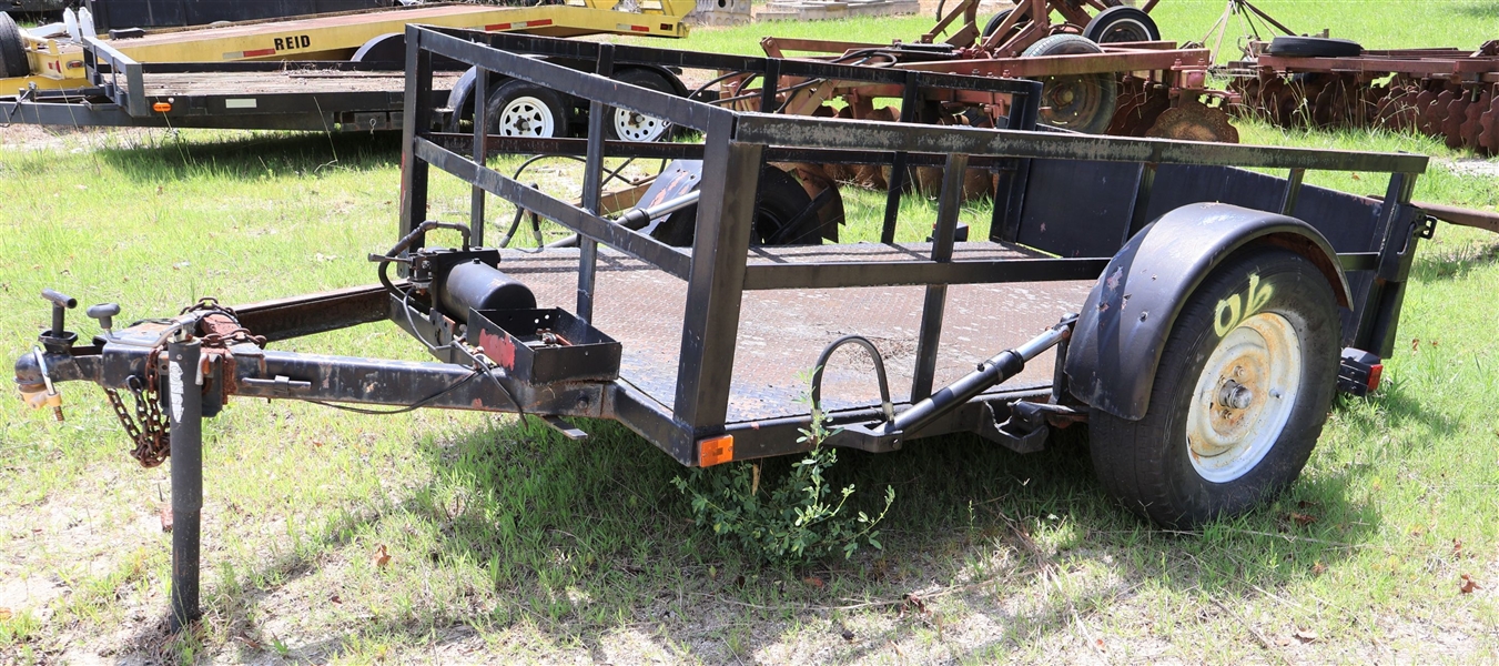 Hydraulic Tilt Trailer with Ramp - Cargo Area Measures 8ft by 5ft