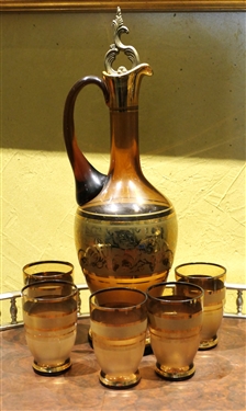 Beautiful Decanter and Cordial Set with Gold Decoration - Etched Flowers - Decanter Measures 12" tall Each Glass Measures 3 1/2" Tall 