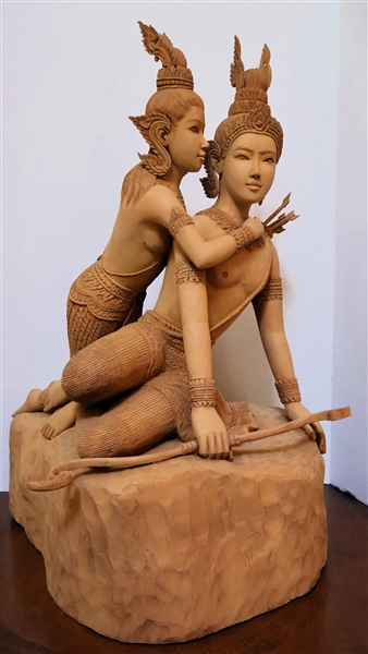 Outstanding Thai Wood Carving - of Man and Woman - Figures Carved From Single Piece of Wood - Man Has Bow and Quiver of Arrows  - Statue Measures 28" tall 14" by 18" - One Arrow Feather is Broken 