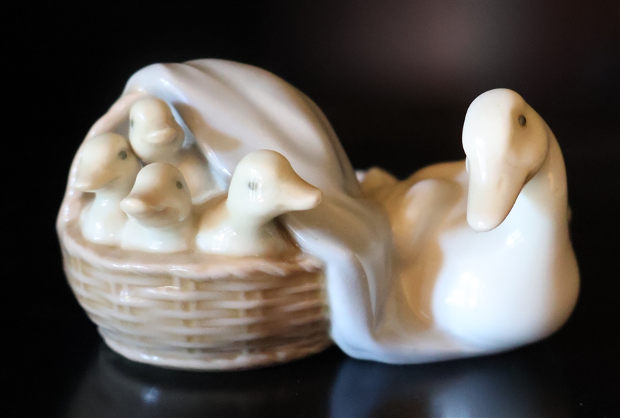 Lladro Mama and Baby Geese in a Basket Figure - Measures 2 1/2" by 4" - Small Chip on Underside of Mama Gooses Wing and Foot