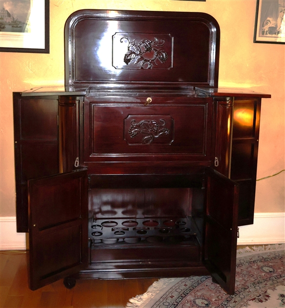 Mahogany Bar Cabinet - Carved Grape Motif on Front and Sides - Many Many Storage Compartments for Glasses and Bottles - Closed Measures 42" tall 36" by 18"