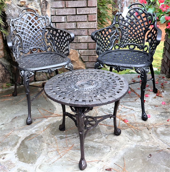 Nice 3 Piece Garden Set - 2 Cast Aluminum Arm Chairs with Lattice Weave Back  - Ball and Claw Feet and Matching Small Table - Table Measures 18" Tall 20 1/2" Across - Each Chair Measures 32" tall...
