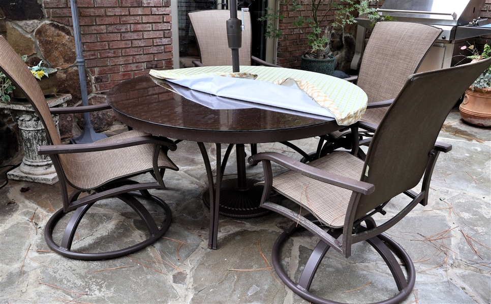 Very Nice Homecrest Patio Table and 4 Swivel Chairs - Table Has Glass Top - Table Has Been Covered - Table Measures 27" Tal 55" Across