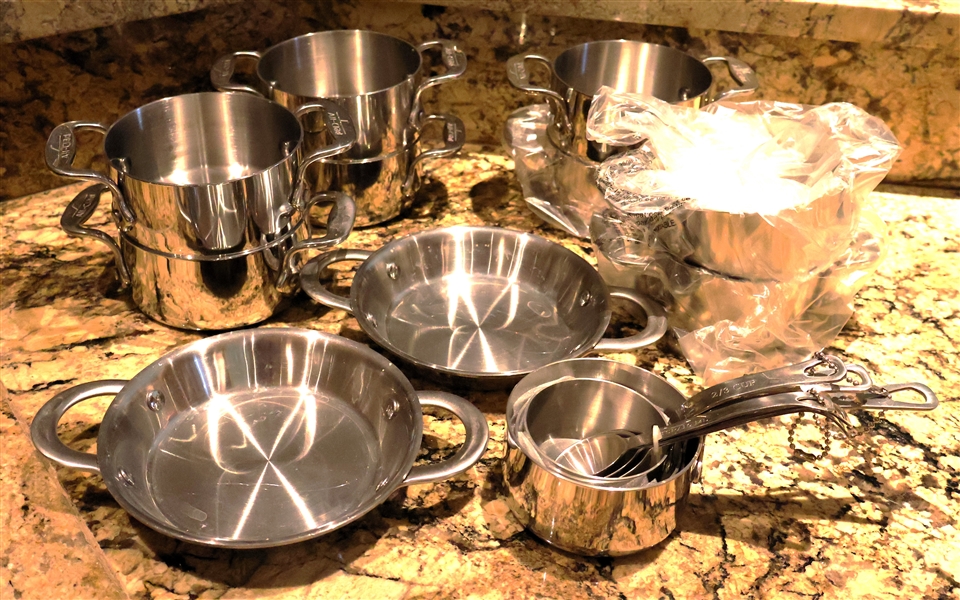 Lot of Kitchenware including 8  All-Clad Individual French Onion Soup Pots, 2 Calphalon 6" Skillets, and New Set of Stainless Steel Measuring Cups and Spoons