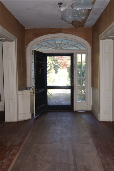 Foyer - Facing Front Door - Nice Wood Work - Hardwood Floor Throughout