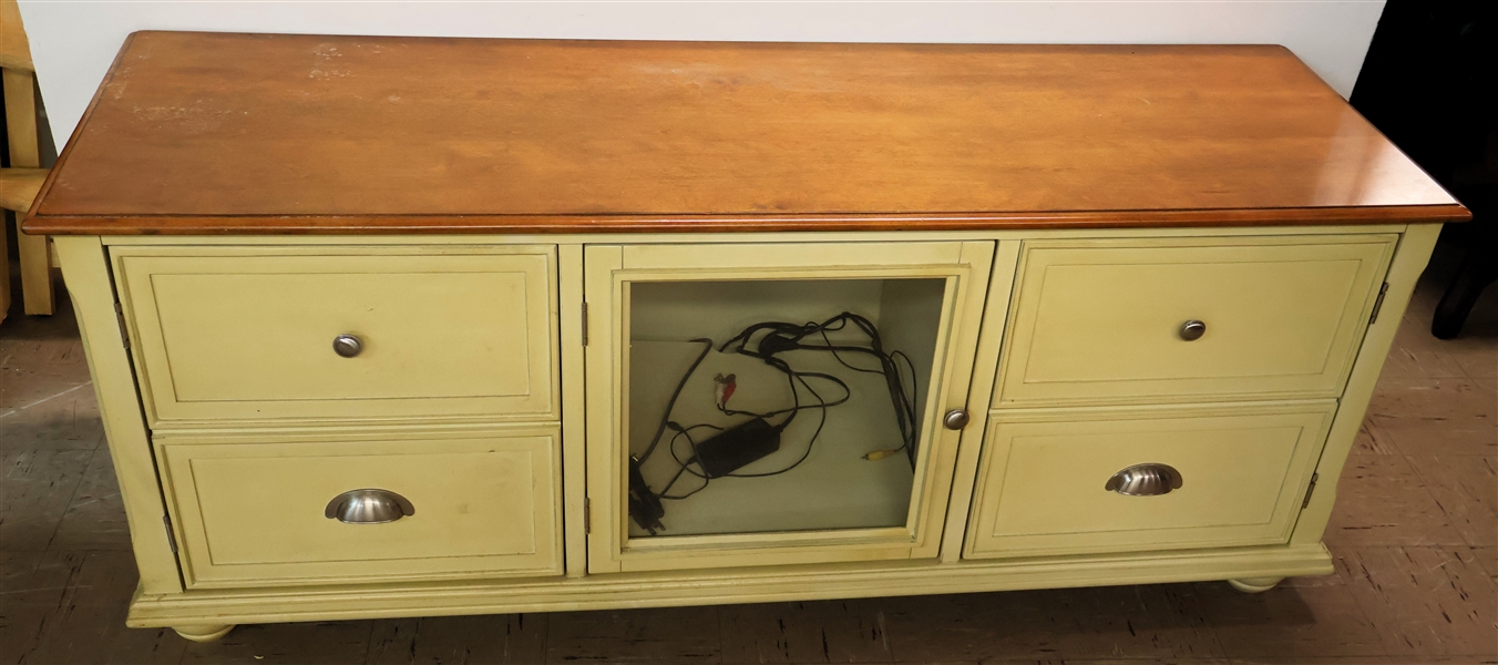 Cream Painted TV Cabinet with Natural Wood Top - Glass Door in Front with 2 Drawers Flanking Each Side - Measures 25" Tall 62" by 20" 