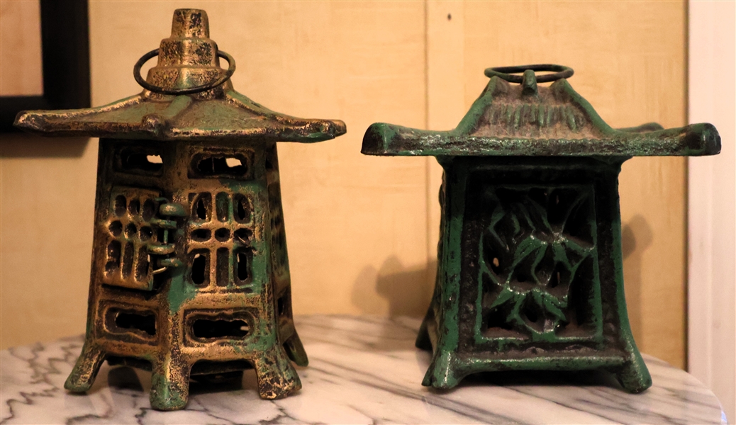 2 Cast Iron Pagodas - Green Iron Candle Holder and Gold with Spring Door with Screw Out Bottom - Gold Measures 4 1/2" tall 7" Across