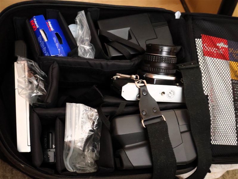 Case Full of Camera Equipment including 2 Polaroid Instant Cameras, Asahi Pentax - KC 1000, and Other Camera - With Instructions in Bear Mountain Gear Case