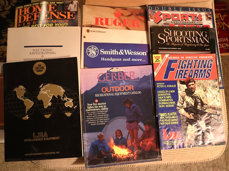 Group of Military and Gun Magazines and Booklets including - "Fighting Firearms" "Shooting Sportsman" "Sports Afield - Anniversary Edition" Smith & Wesson, and Gerber