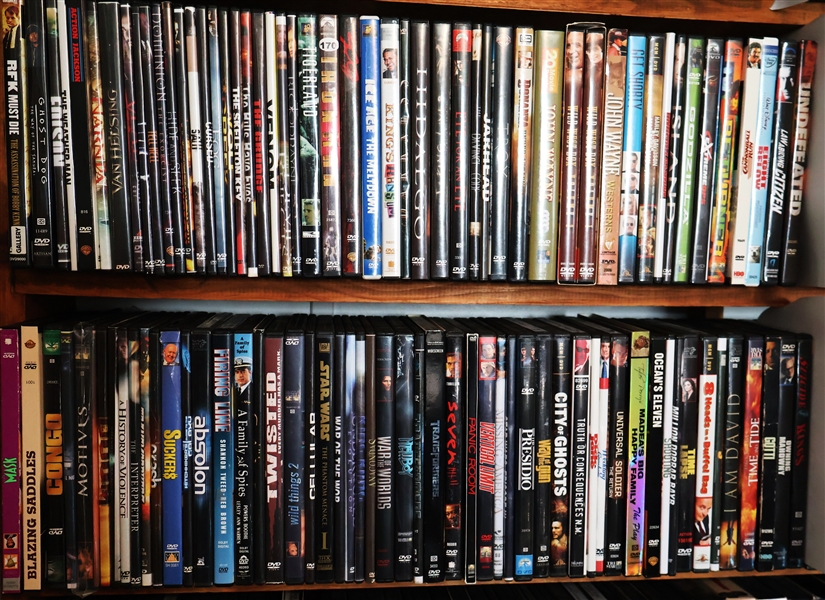 Lot of 104 DVDs including "Godzilla" "John Wayne" "Oceans Eleven" "Madea" "Ice Age" "Congo" "The Mask"