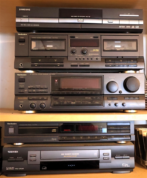 Stereo Equipment Including Samsung DVD/CD Player, Technics HX Pro Tape Deck, Technics SA-GX303 Receiver, Technics CD Player - SL-P150, and Toshiba VCR 