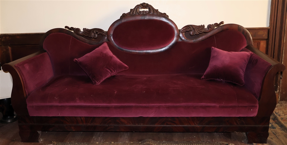 Beautiful Flame Mahogany Sofa - Hand Carved Scrolled Crest - Maroon Velvet Upholstery - Measures 42" Tall 81" by 25" 