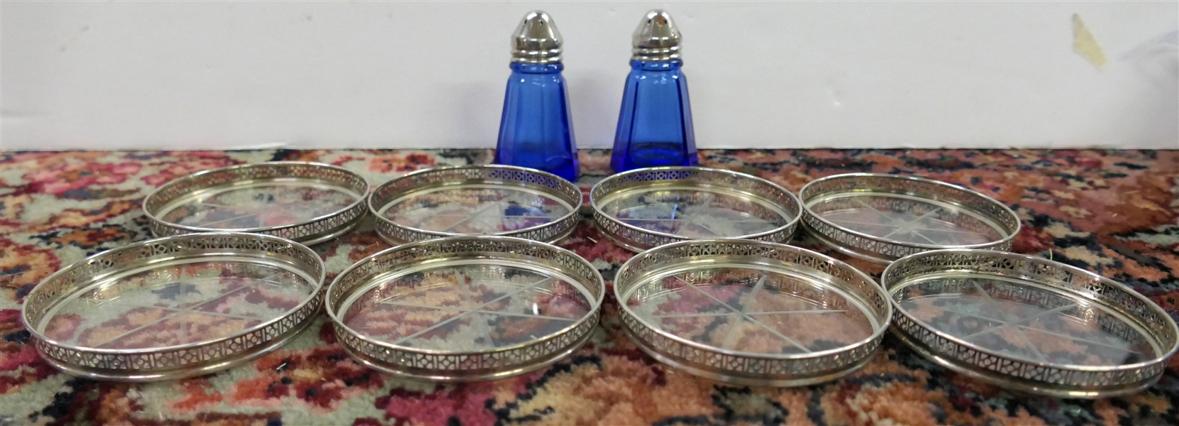 8 Sterling Silver Rimmed Coasters and Pair of Cobalt Blue Salt and Pepper Shakers 