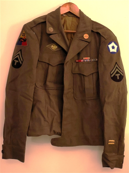 WWII Jacket Belonging to Donald Goodman 11th Armored Division "Thunderbolt" -  Co. "A" 22nd Tank - Jacket Has Patches, Pins, Buttons, Ribbons, and 2 Years of War Stripes - Size 38L - Jacket is in...