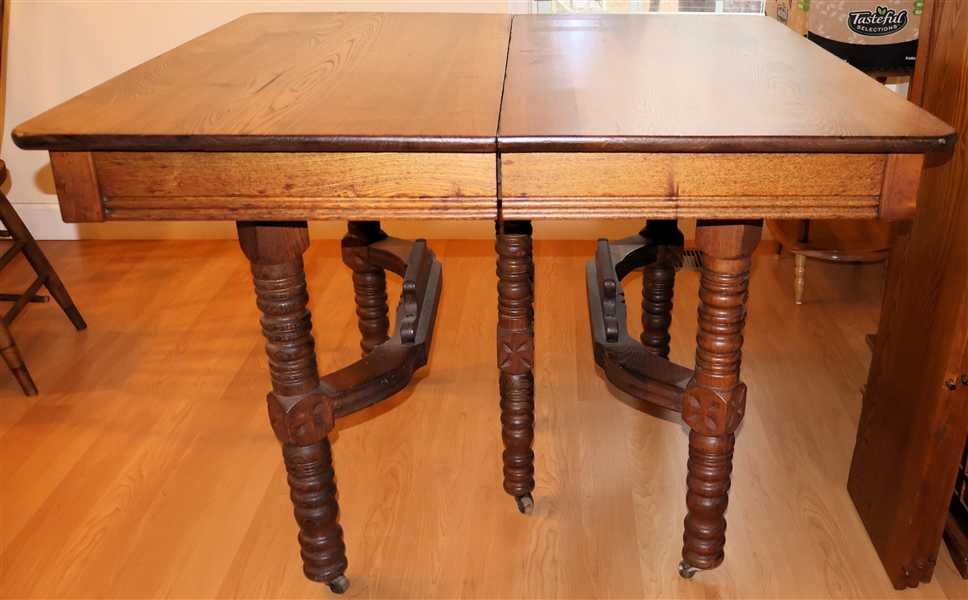 Nice Early Twentieth Century Quarter Sawn Oak Table with 3 Leaves - 6 Turned Legs and Carved Base - Table Measures 30" Tall 42" by 42" - Each Leaf Measures 11" Wide