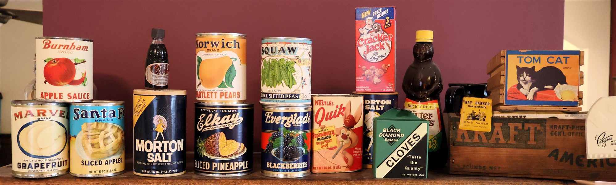 Collection of Vintage Tins and Boxes including Mortons Salt, Squaw Beans, Black Diamond Cloves, Cracker Jacks, Aunt Jemima Syrup, Tom Cat Citrus, Kraft American Cheese, and Others