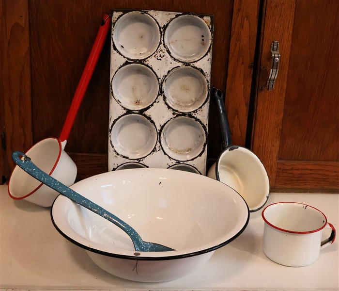 Lot of Enamelware including Muffin Pan, Red and White Dipper, Blue and White Pot, Bowl, Mug, and Blue Spoon
