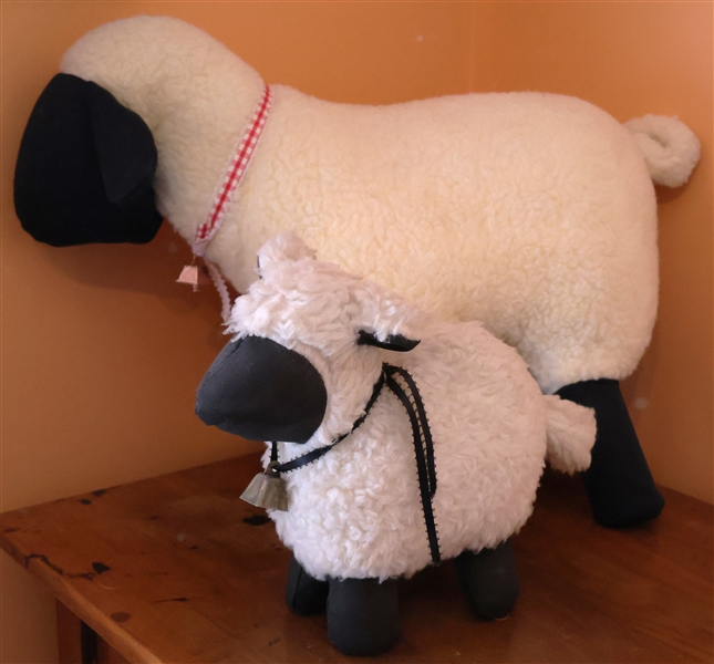 2 Stuffed Sheep with Bells - Larger Measures 14" Tall 24" Nose to Tail Smaller Measures 9" Tall 9" Nose to Tail 