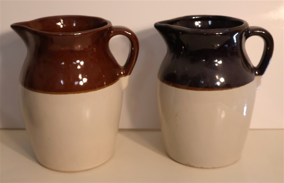 2 Brown and White Stoneware Jugs - Lighter Brown Stamped Roseville Ohio - Measures 9" Tall 