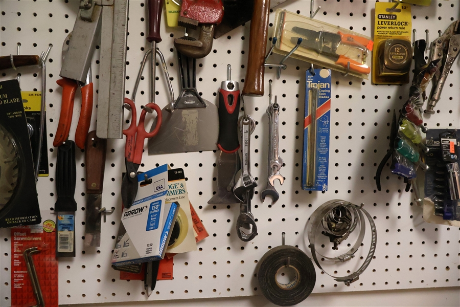 Lot of Tools including Pry Bars, Screwdrivers, Nut Drivers, Wrenches, Hand Drill, Hammers, Snips, Hammer, Mini C Clamps, Wire Cutters, Carbide Tip Saw Blade, Vacuum Clamps, Spark Plug Socket, Etc. 