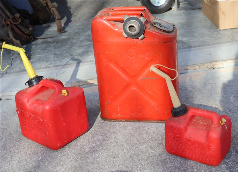3 Gas Cans - 1 Metal 5 Gallon, and 2 Smaller Plastic