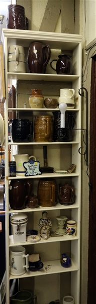 Many Stoneware Pitchers