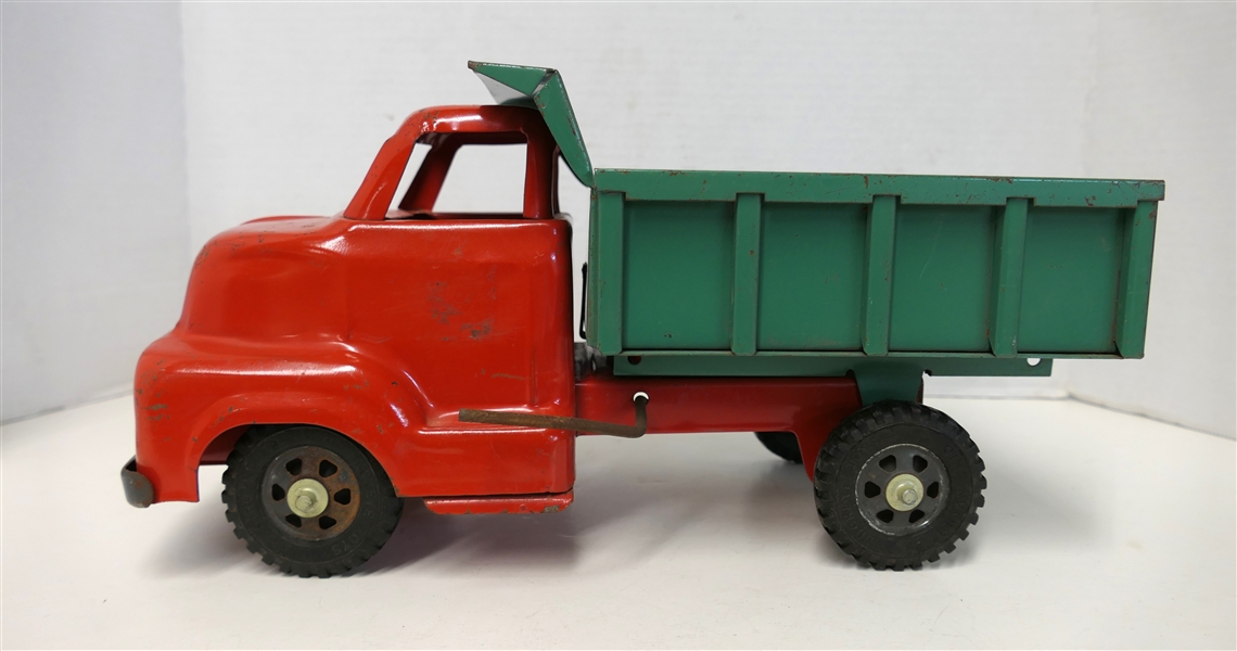 Buckeye Trucks - Bryan, Ohio -  Pressed Steel Dump Truck - Measures 6 1/2" Tall 13" Long - Some Minor Rust on Dump Bed and Cab