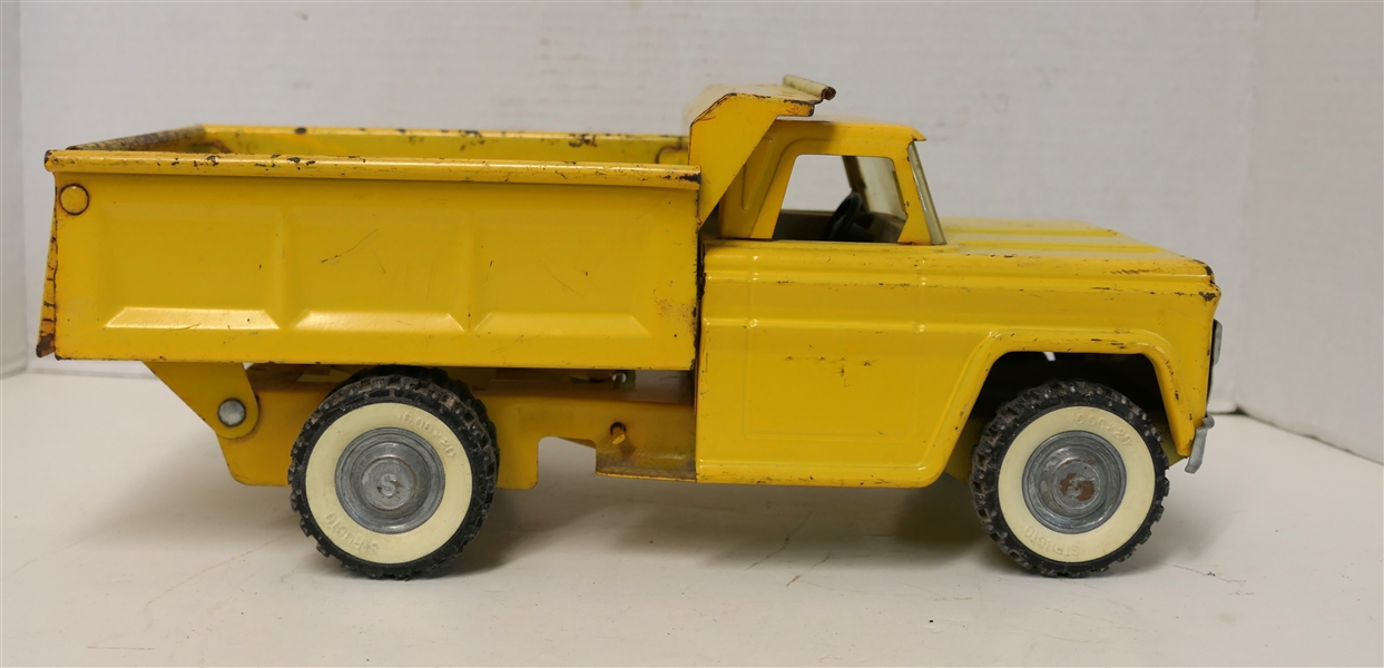 Structo Yellow Pressed Steel Dump Truck - Played with Condition - Measures 6" Tall 14" Long